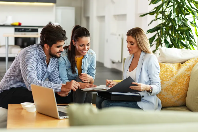 Couple meeting with their loan officer